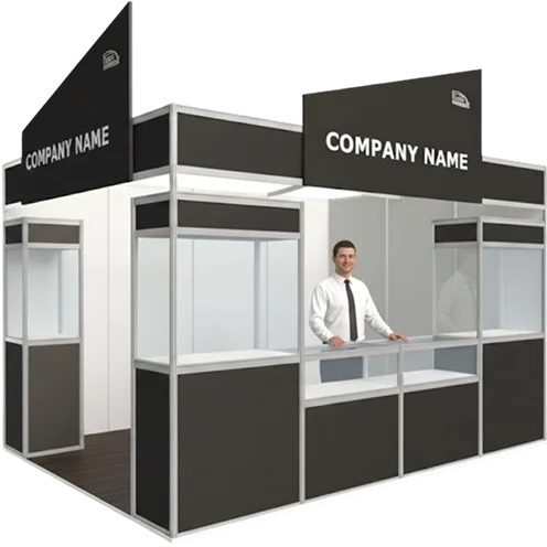 A man stands in front of a company booth, showcasing the company name prominently displayed